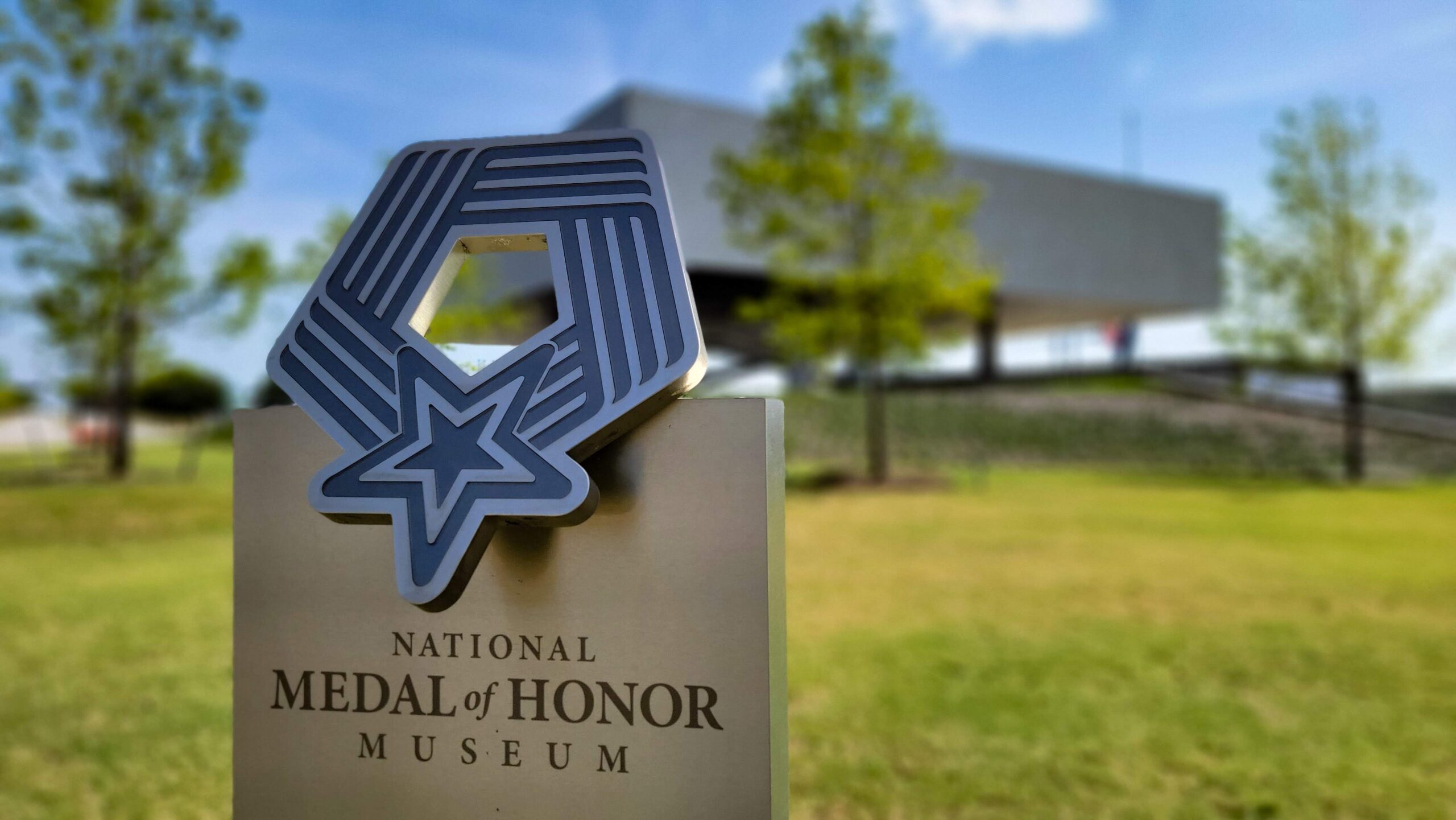The National Medal of Honor Museum medallion marker on the museum grounds in Arlington, Texas